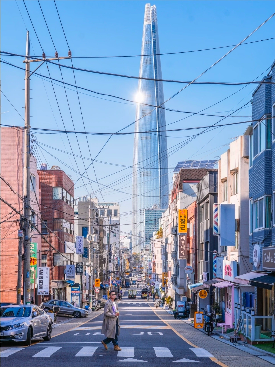Lotte World Tower towering over Seoul neighborhoods